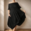 Czarna sukienka oversize z rękawami 3/4 i kieszeniami